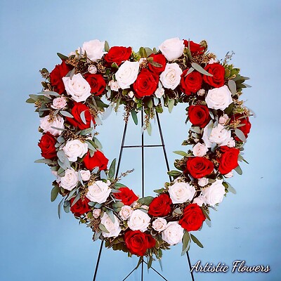 Red and white heart wreath arranged by a florist in Ocala, FL